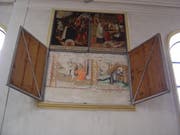 Der alte St. Jost-Bilderzyklus in der Kirche St. Jost in Blatten bei Malters erscheint hinter den hölzernen Tafeln des neueren Bilderzyklus. (Bild: PD)