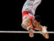 Oliver Hegi am Reck an der EM in Glasgow, wo er die Goldmedaille gewann (Bild: KEYSTONE/AP/DARKO BANDIC)