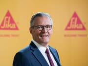Sika-Verwaltungsratspräsident Paul Hälg kann sich über ein neues Rekordergebnis nach neun Monaten freuen. (Bild: KEYSTONE/URS FLUEELER)
