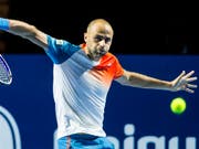 Marius Copil spielt diese Rückhand mit Unterschnitt. (Bild: KEYSTONE/ALEXANDRA WEY)