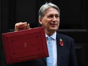 Die britische Regierung erhöht ihre Konjunkturerwartungen. (Bild: KEYSTONE/EPA/ANDY RAIN)