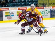 Spiele und Zweikämpfe aus der National League wie hier in der Partie zwischen Geneve-Servette (Jack Skille/vorne) und den SCL Trigers (Federico Lardi) werden ab sofort auf einer Streaming-Plattform in Tschechien und der Slowakei ausgetrahlt (Bild: KEYSTONE/SALVATORE DI NOLFI)