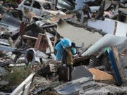 Auf der indonesischen Insel Sulawesi werden nach dem Erdbeben und dem Tsunami noch über 5000 Personen vermisst. (Bild: KEYSTONE/AP/AARON FAVILA)