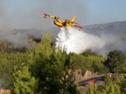 Grosseinsatz für die Löschkräfte: Das Feuer wütete bei Sintra, vor den Toren Lissabons. (Bild: KEYSTONE/AP/ARMANDO FRANCA)