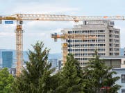 Ein heisser Herbst zeichnet sich auf dem Bau ab: Baustelle der ETH Zürich. (Bild: KEYSTONE/CHRISTIAN BEUTLER)