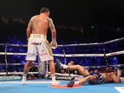 Alexander Usyk (links) schlägt Tony Bellew in der 8. Runde k.o. (Bild: Keystone/AP/Nick Potts)
