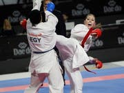 Ramona Brüderlin (rechts) verlor ihren Kampf um WM-Bronze in der Kategorie über 68 kg (Bild: KEYSTONE/EPA EFE/VICTOR LERENA)