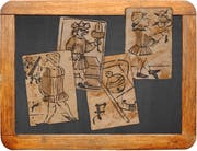 Die heute noch gebräuchlichen Motive tauchen schon früh auf: Jasskarten aus der Schweiz aus der Zeit 1590–1600. (Bilder: Schweizerisches Nationalmuseum/Montage: stb)