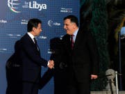 Italiens Premierminister Giuseppe Conte (l.) begrüsst den libyschen Regierungschef Fajis al-Sarradsch in Palermo. (Bild: KEYSTONE/AP ANSA/MIKE PALAZZOTTO)