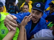 Menschenrechts-Aktivisten werfen dem Präsidenten Daniel Ortega (im Bild), Vizepräsidentin Rosario Murillo und weiteren Ministern Verbrechen gegen die Menschlichkeit vor. (Bild: KEYSTONE/EPA EFE/JORGE TORRES)