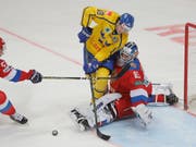 Der neue EVZ-Ausländer Dennis Everberg (im gelben Trikot) wurde mit Schweden 2017 und 2018 Weltmeister (Bild: KEYSTONE/EPA/SERGEI ILNITSKY)