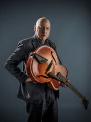 Gitarrist und Sänger Mark Knopfler.