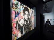 Michael Jackson in einer Darstellung des Künstlers Mr Brainwash: Das Gemälde ist Teil der Ausstellung «Michael Jackson: On the Wall», die das Grand Palais in Paris bis 14. Februar 2019 zeigt. (Bild: KEYSTONE/EPA/IAN LANGSDON)