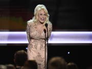 Am Freitag veröffentlicht Country-Sängerin Dolly Parton «Dumplin'» - den reichhaltigen Soundtrack zum gleichnamigen Netflix-Film. (Bild: Keystone/AP Invision/CHRIS PIZZELLO)