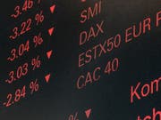 Trotz der jüngsten Turbulenzen am Aktienmarkt sollen Anleger ihr Geld weiterhin in Aktien investieren, um ansehnliche Renditen zu erzielen, rät die Credit Suisse. (Bild: KEYSTONE/ENNIO LEANZA)
