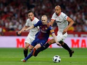 Andres Iniesta wurde mit dem FC Barcelona neunmal spanischer Meister und gewann mit den Katalanen viermal die Champions League (Bild: KEYSTONE/AP/PAUL WHITE)