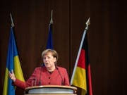 Die deutsche Kanzlerin Angela Merkel fordert beim Deutsch-Ukrainischen Wirtschftsforum in Berlin eine friedliche Lösung des Konflikts zwischen Russland und der Ukraine. (Bild: KEYSTONE/EPA/HAYOUNG JEON)
