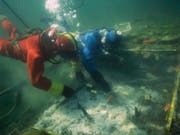 Ein Unesco-Abkommen soll Pfahlbauten in der Schweiz schützen - ebenso wie Unterwasser-Kulturgüter weltweit. So möchte es der Bundesrat. Im Bild Forschungsarbeiten an einer Siedlung im Kanton Zürich. (Bild: KEYSTONE/BAK / Amt fuer Staedtebau)
