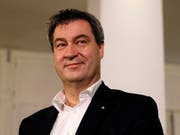 Für den amtierenden und künftigen Ministerpräsidenten Söder kann Bayern grüner werden - auch ohne die Grünen. (Bild: KEYSTONE/EPA/RONALD WITTEK)