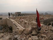 Fast die Hälfte der entdeckten Massengräber befinden sich in der Region Mossul. (Bild: KEYSTONE/AP/KHALID MOHAMMED)