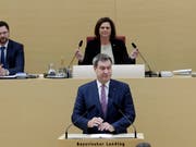 Markus Söder kann als Ministerpräsident von Bayern weitermachen. Nach der Wahl appellierte Söder an die Ratsmitglieder, fair miteinander umzugehen. (Bild: Keystone/AP/Matthias Schrader)