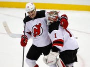 Der dreifache Torschütze Brian Boyle und Goalie Keith Kinkaid waren die Matchwinner der Devils (Bild: KEYSTONE/AP/GENE J. PUSKAR)