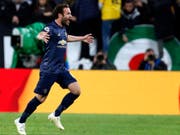 Manchesters Joker Juan Mata lässt sich nach dem Ausgleichstreffer feiern (Bild: KEYSTONE/AP/ANTONIO CALANNI)