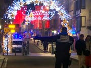 Der Ort des mutmasslichen Terroranschlags: Der Strassburger Weihnachtsmarkt am Dienstagabend. (Bild: KEYSTONE/APtn)