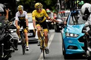 Geraint Thomas stosst auf seinen Toursieg an. (Bild: Marco Bertorello/AP (Paris, 29. Juli 2018))