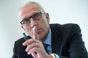 Pierin Vincenz, Chef der Raiffeisen Gruppe, während einer Pressekonferenz. (Keystone/Marcel Bieri (Bern, 8. Januar 2014))