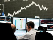 Die Aktienmärkte finden kurz vor Jahresende keinen Boden: Auch in der Schweiz fallen die Kurse am Donnerstag weiter. (Bild: KEYSTONE/AP/MICHAEL PROBST)
