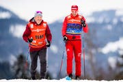 Markus Cramer mit dem russischen Athleten Sergej Ustjugow. (Bild: Jon Olav Nesvold/Imago (Oberstdorf, 2. Januar 2018))
