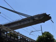 Die Morandi-Brücke in Genua einen Tag nach ihrem Zusammensturz Mitte August. 43 Menschen waren ums Leben gekommen. (Bild: Keystone/EPA ANSA/LUCA ZENNARO)