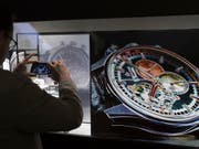 Die Uhren- und Schmuckmesse Baselworld zeigt sich offen für Gespräche über eine Kooperation mit der Genfer Uhrenmesse SIHH. (Bild: KEYSTONE/GEORGIOS KEFALAS)