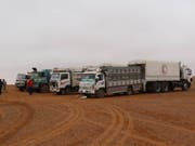 369 Lastwagen bringen seit Sonntag Hilfsmittel für 650'000 Syrer ins Land. (Bild: KEYSTONE/EPA SARC/SARC HANDOUT)