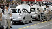 Arbeiter im Werk von Volkswagen in Foshan in der südchinesischen Provinz Guangdong. (Bild: Getty (25. September 2013))