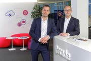Sie werden künftig noch enger zusammenarbeiten: Olvier Stahel, CEO Arcade Solutions AG und Stephan Marty, CEO Energie Wasser Luzern (ewl). (Bild: pd)