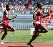 Dank Hormondoping den Gegnern (Carl Lewis, links) weit voraus: der Kanadier Ben Johnson (Bild: AP/Gary Kemper)