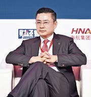 Der HNA-CEO Adam Tan bestreitet die Finanzprobleme. (Bild: Niu Bo/Keystone (Peking, 28. November 2017))