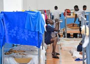 Flüchtlinge im Empfangszentrum Pozzallo in Italien. (Bild: Getty/Ricky Carioti)