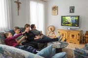 Die meisten Schweizer Kabelnetzkunden beziehen ihr Angebot bei UPC Cablecom. Kleine Anbieter mischen aber erfolgreich mit. (Bild: Keystone/Elisabeth Real)