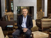 Der ägyptische Investor Samih Sawiris in seinem Hotel "The Chedi" in Andermatt: Höhere Verluste beim Hotelgeschäft in Andermatt und anderen Beteiligungen liessen den Gewinn von Sawiris Konzern Orascom schwinden. (Archiv) (Bild: KEYSTONE/CHRISTIAN BEUTLER)