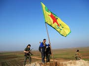 Die syrischen Kurden haben im Laufe des Bürgerkrieges grosse Teile Nordsyriens erobert. Nun fordern sie die Autonomie der von ihr kontrollierten Gebiete (Archiv). (Bild: /EPA/STR)
