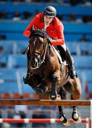 Steve Guerdat und Nino Des Buissonnets. (Bild: AP/John Locher)
