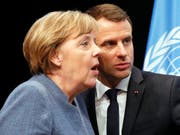 Bundeskanzlerin Angela Merkel und Frankreichs Präsident Emanuel Macron in Bonn während der Eröffnung des Ministerteils der Klimakonferenz. (Bild: KEYSTONE/EPA/RONALD WITTEK)