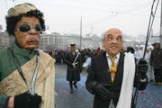 Bundesrat Hansruedi Merz und Libyens Staatspräsident Muammar Ghadaffi. (Bild René Meier/Zisch)