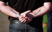 Tätowierte Kindernamen: ein Versprechen, verlässlich zu sein. (Bild: Ian Forsyth/Getty)