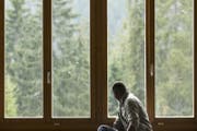Ein Flüchtling in einer Asylunterkunft. (Bild: Keystone/Alexandra Wey)