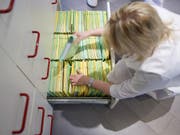 Patientendaten auf Papier gehören bald der Vergangenheit an. (Symbolbild Keystone)