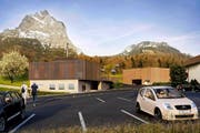 So könnte die neue Talstation der Rotenfluh-Bahn aussehen, rechts hinten das Parkhaus. (Bild: Visualisierung Architron)